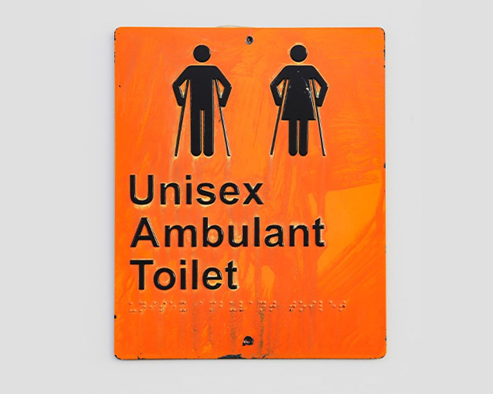 Braille restroom signs