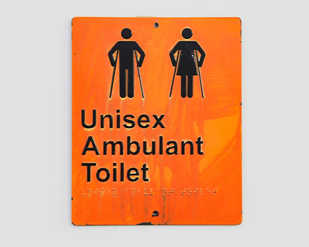 Braille restroom signs